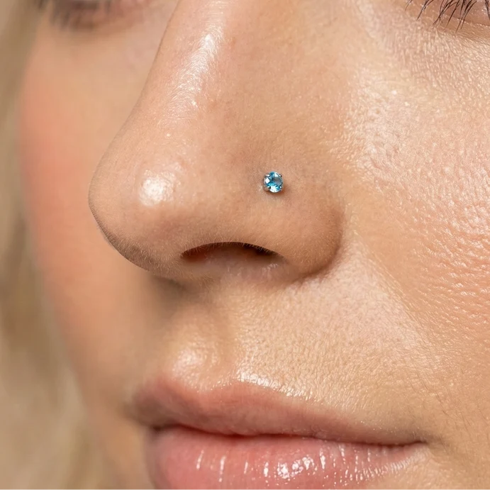 9k gold blue topaz nose stud claw set natural blue stone 9k gold blue topaz nose stud claw set natural blue stone